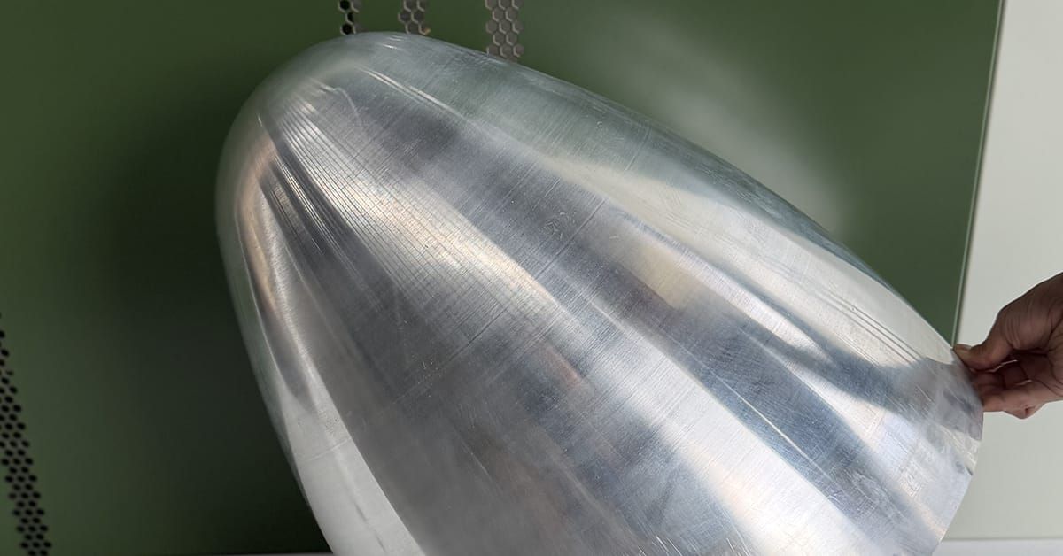 Precision aluminum metal spinning for aerospace UAV housings.