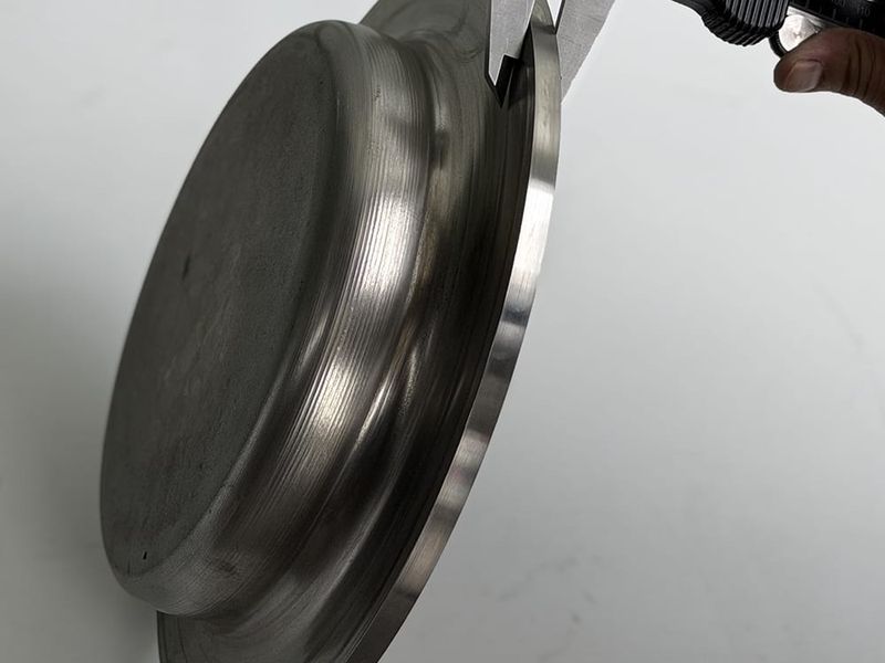 SUS310S heat-resistant stainless steel spinning part for high-temperature industrial equipment with mirror polish.